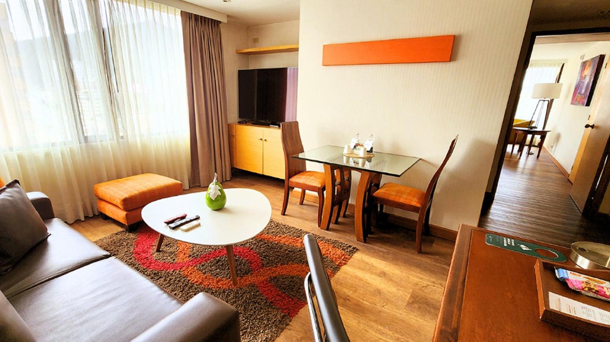 Bogota Plaza Hotel Bagian luar foto A living room in a serviced apartment in Beijing, China